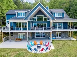 Dog-friendly lakefront home with a game room, children's items, and firepit