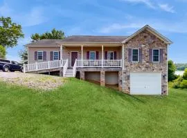 Two-story, lakefront getaway with dock, beach, grill, 2 kayaks, 2 canoes, AC