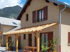 Le Pré Fleuri à Guillestre - Appartements neufs classés Meublés de Tourisme 3 étoiles- Climatisés- Parking privatif