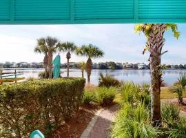 Lakefront dog-friendly condo with water views pool hot tub & beach access