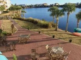 Stylish condo with lake views bike rentals & pools - walk to the beach