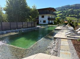 Appartements Andrea Cäciel - Alpline Appartements KG, hotel i Brixen im Thale