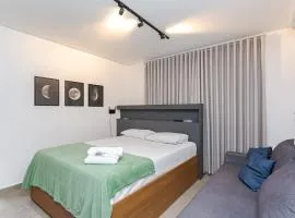 Apartamento 206 - Eixo · Studio completo px Jd Botânico | Enxoval + A/C 4p