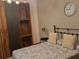 Basic double bedroom private bathroom close to Malta airport