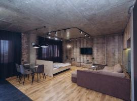 Stylish Loft Apartment with Free Parking, хотел в Суми