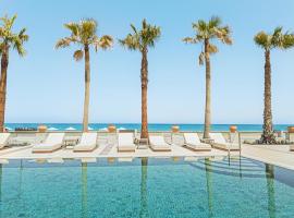 Grecotel Plaza Beach House، فندق في مدينة ريثيمنو