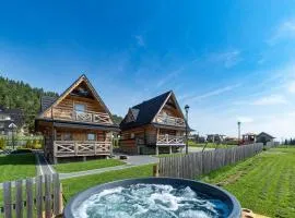 Osada Szaflary - jacuzzi na wyłączność dla każdego domku, ogólnodostępna sauna i plac zabaw w cenie