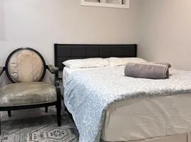 Studio Basement Suite with Double Bed and kitchen, Entrance from Garage