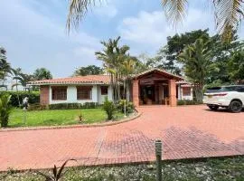 Casa en condominio campestre de Guamal con vista al Rio Camelias