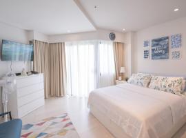Tambuli Resort Living-Deluxe Studio by PMFH, hotell i n&aelig;rheten av Mactan-Cebu internasjonale lufthavn i Maribago
