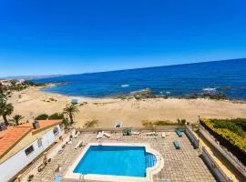 Apartamento El Calón, primera línea de playa, piscina y vista al mar