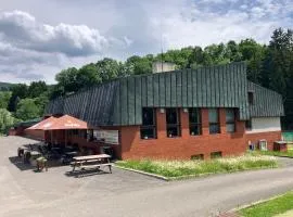 Apartmány ve sportovní hale