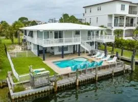Canal-front home with pool 40' boat slip gated beach access - 1 block to sand