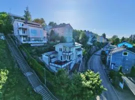 Villa Rajaportti Loft House-Sleeps 14-Lake Views-Sauna Capital-Front Yard Parking-Electric Vehicle