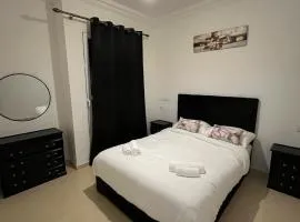 Cozy Modern 2BR Close to Airport, Beach w Wi-Fi