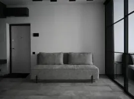 Modern Dark Minimalist Apartment with Panoramic Views