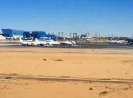 Premium 3BR Hotel Apartment with Direct Airport View