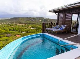 Charming cottage located in Cap Estate - Orchid Cottage home