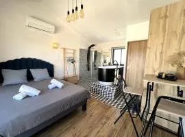 Studio cosy avec balnéo et climatisation