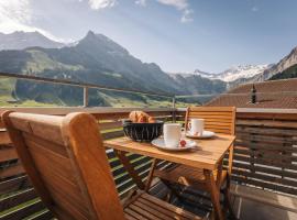Chuenislodge1 - Traum Panorama - Balkon - Tiefgarage, hótel í Adelboden