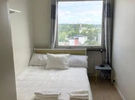 Walk to Everything Bright High-Floor Apt & Balcony