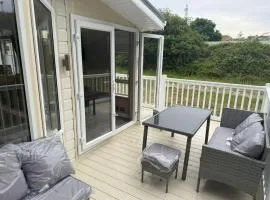 Stylish caravan with decking at Valley Farm, Essex ref 46168V