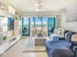 Beachfront water view condo with pool sundeck private balcony and WD