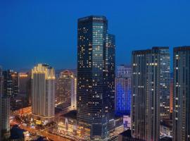 Novotel Dalian Zhongshan Square، فندق في داليان