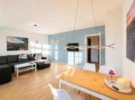 Urlaubsmagie - Ferienwohnung Himmelblau - Balkon, Gemeinschaftsgarten, Sauna und saisonaler Pool