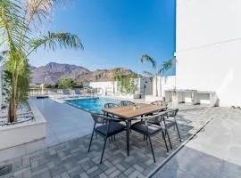 Escape to a Modern 3BR Villa with a Private Pool and Mountain Views, Al Dana Island, Fujairah by Deluxe Holiday Homes