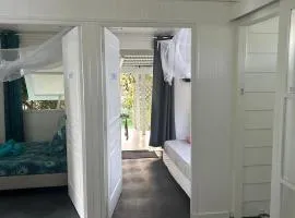 LE FARE BLEU DUO 2 chambres climatisées avec 1 salle de bain - bord de lagon à Tiputa Rangiroa - vélos gratuits et snorkeling