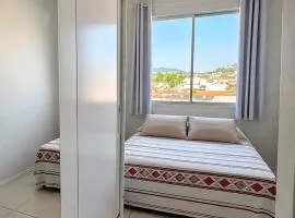 Quarto Aconchegante em Residência Familiar