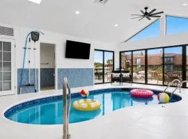 NEW! 4BR I Indoor Pool on the Bay in Boat Town USA
