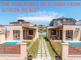 SALVE holiday houses, hotel in Paralia
