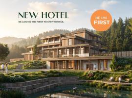 Hotel Wada - Rimski vrelec، فندق في Kotlje