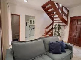Casinha 100mts da praia, com piscina e 2 suítes com ar condicionado