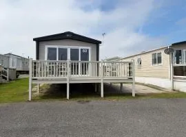 Caravan by the sea Trecco Bay