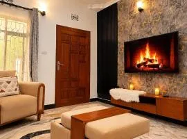 Cozy Retreat in Arusha - power 24hrs -Firepit - Free Parking- Garden swing- Fast Wi-Fi