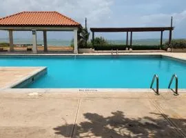 Beachfront Ocean View Loft with Beach, Pool and Parking