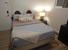 Luxury Single Suite with a closet, ensuite bathroom & laundry & dining space & kitchen