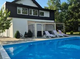 Lika Relax and Party House with sauna, jacuzzi and outdoor heated swimming pool