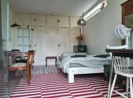 Quiet room with balcony and garden view