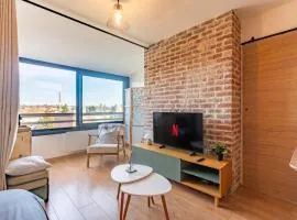 Cocon Cosy & Design avec Briques et Poutres