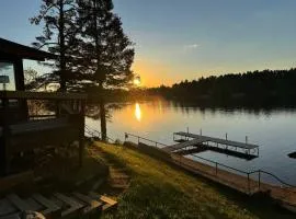 6BR Waterfront Lodge on Round Lake Private Sandy Shoreline Dock Fire Pit Panoramic Views