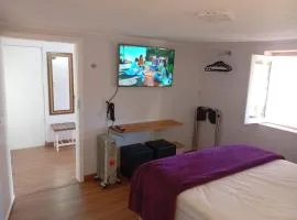 Quarto Aconchegante Monte Verde - Q2
