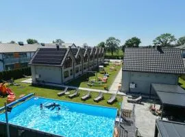 Domki Gala- blisko plaży, basen z podgrzewaną wodą , sauna , parking