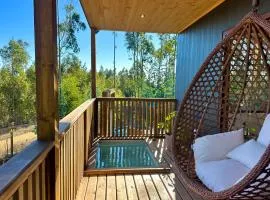 Cabaña en el bosque con tinaja privada