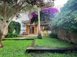 Mediterranean house, beach and charm garden