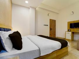 Hotel O by OYO REFRESH INN & SUITES، فندق في كوجيكود