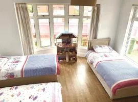 2 BEDROOM FAMILY APARTMENT, Private Car Space & Garden & Entrance , in front of the Pier & Beach , Bedroom1 Double bed ,Bedroom 2 , 3 single beds